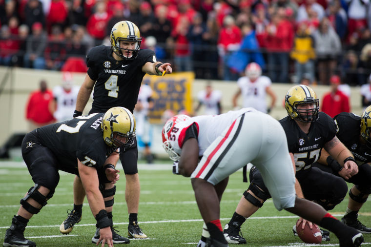 October 19, 2013: Patton Robinette (4) reads the defense during the game against Georgia. The Commodores defeated the Bulldogs 31-27, marking their first victory against Georgia since 2006 and second since 1994. The win gives Vanderbilt a 4-3 (1-3 SEC) record heading into next weeks matchup with Florida. (Bosley Jarrett) 