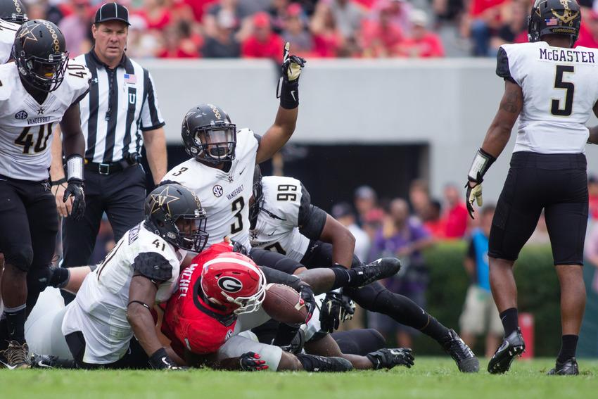 October 15th, 2016 – The Commodores defense makes a stop during their 17-16 win against the University of Georgia in Sanford Stadium Saturday afternoon.
