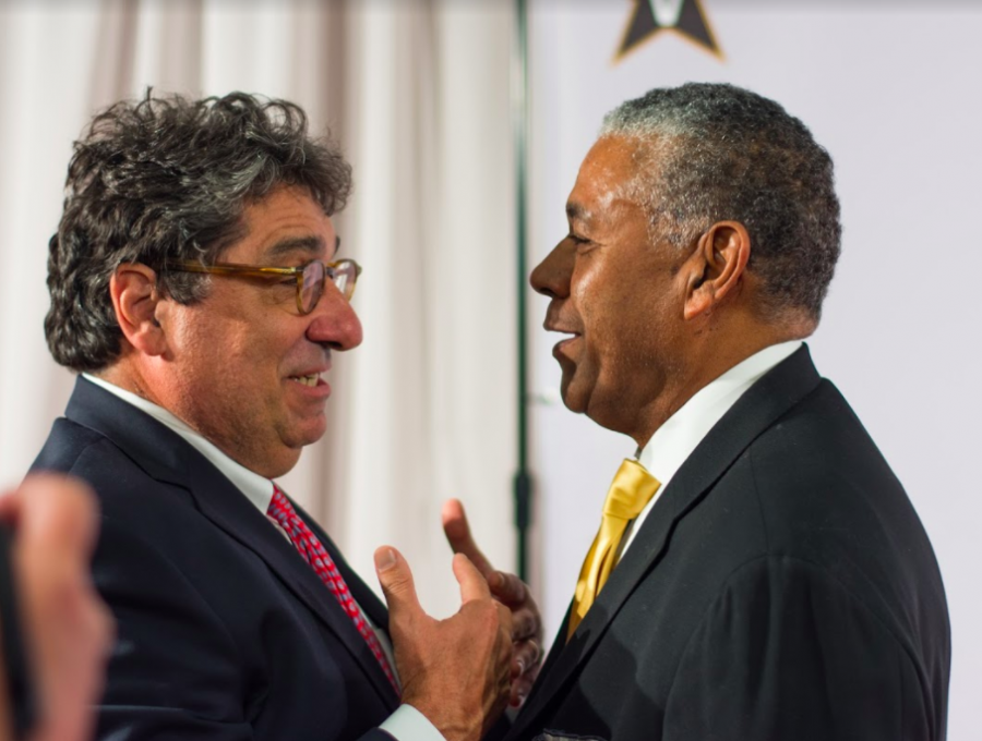 Chancellor Nicholas Zeppos (left) and Godfrey Dillard (right) meet at the red carpet before the premiere of Triumph.