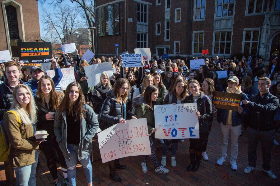 Vanderbilt students, faculty and members of the Nashville community gather in front of Central Library to participate in the National Walkout for Gun Control. The event, which was in remembrance of the Parkland shooting victims, took place from 10 to 10:17am on Wednesday, March 14, 2018. (Photo by Claire Barnett)