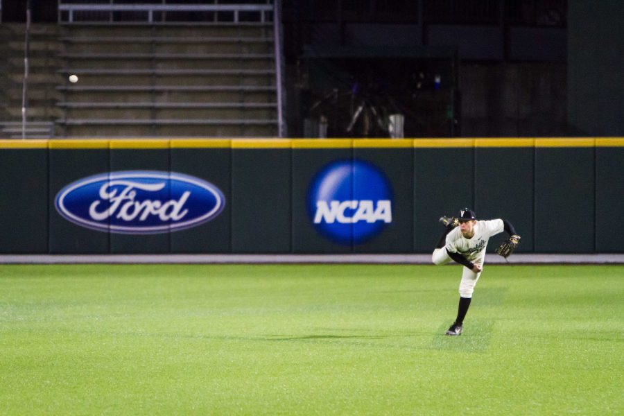 Pat DeMarco unleashes a throw home from center field against Eastern Kentucky (Photo by Hunter Long)