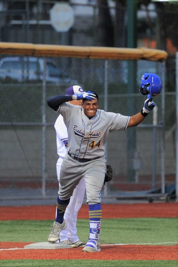 Jayson celebrates a hit while at Bishop Amat high school. 