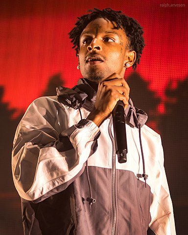 By Ralph Arvesen from Round Mountain, Texas - 21 Savage performing in Austin, Texas (2016-06-16), CC BY 2.0, https://commons.wikimedia.org/w/index.php?curid=70567232