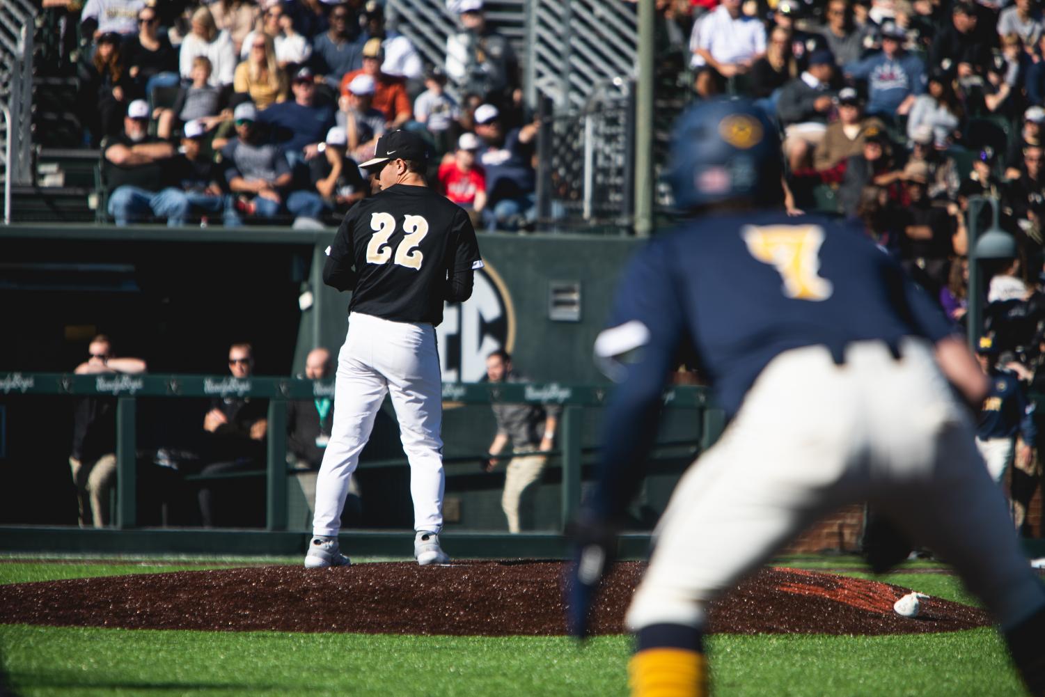 Jack Leiter pitches from the stretch in the first inning of Vanderbilts home exhibition with Michigan.