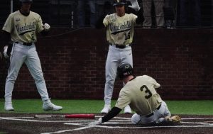 Cooper Davis (3), who chose Portland by Drake as his entrance music, slides into home in Vanderbilts win over South Alabama.