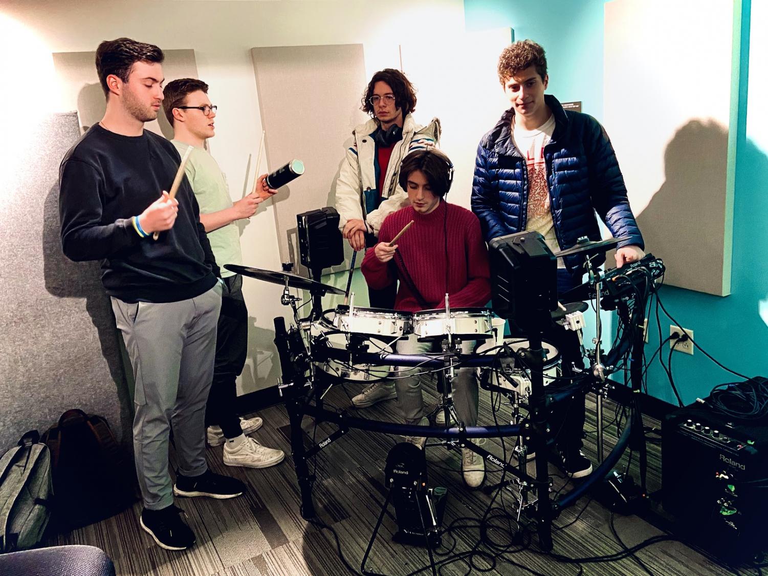Members of funk-pop band Bottom Text practice their latest set. Photo by Andrei Olaru 