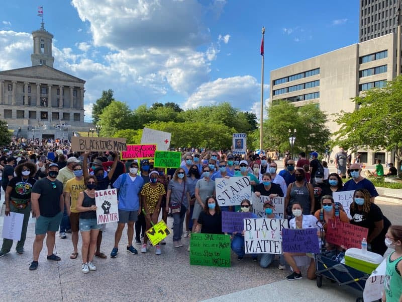 Nashville+healthcare+workers+gather+in+Legislative+Plaza+to+protest+police+brutality+as+part+of+a+larger+Black+Lives+Matter+march%2C+Saturday%2C+June+14.+%28White+Coats+March+for+Justice%2FSent+to+The+Hustler+by+Katlin+Elrod%29