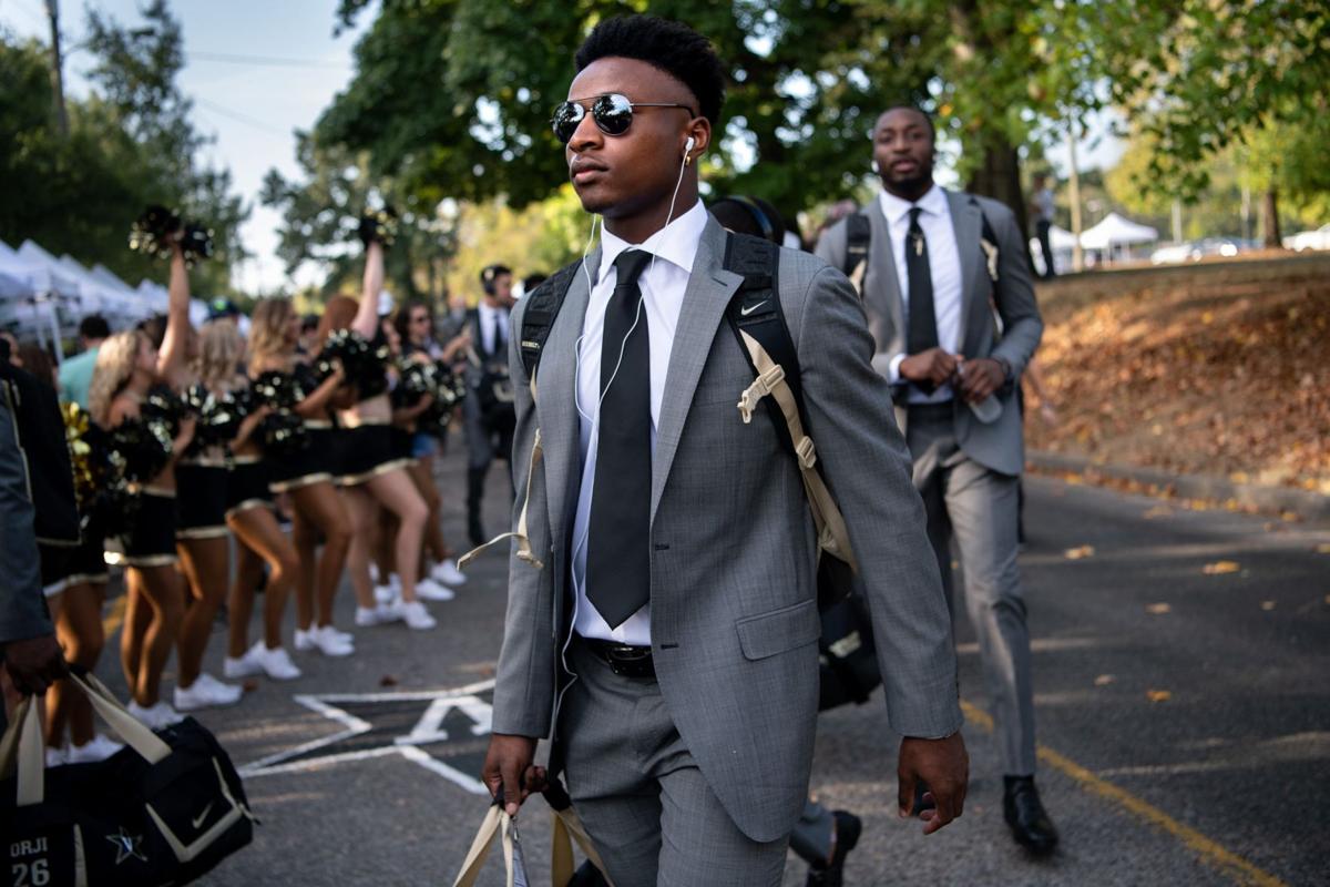 Camden Coleman takes place in the Commodores pregame walk before a game in 2019. (The News-Gazette)