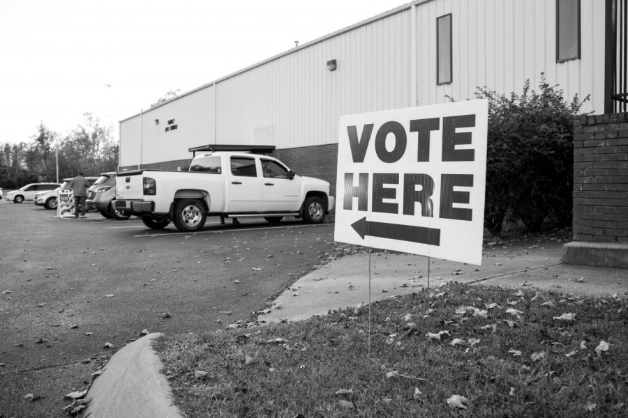 A sign reads “vote here” outside of a Nashville 2019 polling location. (Hustler Multimedia/Claire Barnett)  