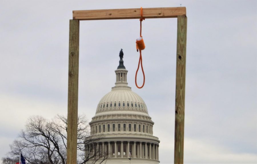 A gallows hangs near the United States Capitol during the storming of the United States Capitol on Jan. 6, 2021. (Creative Commons/Tyler Merbler)