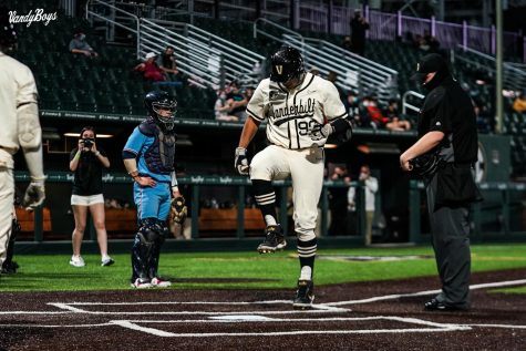 Jayson Gonzalez stomps on home plate after a solo home run against Belmont on March 16, 2021. (Twitter/@VandyBoys)