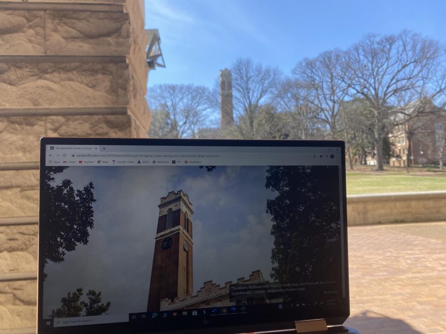 Riddhi Singhania compares her 13 inch image of Kirkland Hall to the real building in-person. (Hustler Staff/Riddhi Singhania)