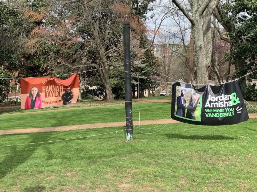 Image of campaign signs outside of Rand Dining Center. Photo taken on March 22, 2021. (Hustler Staff/Rachael Perrotta)