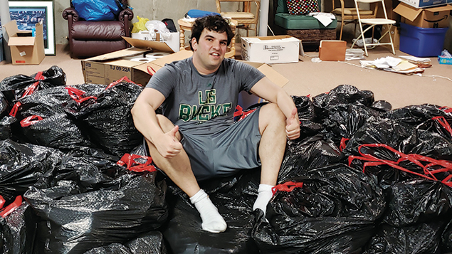 Daniel Marks (B.A. 13) collects unused toiletries from mens and womens basketball programs across the country for charity. (Daniel Marks)
