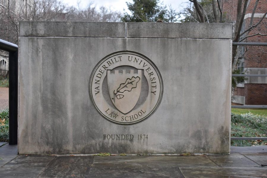 an image of the Vanderbilt Law School emblem on the wall of the building