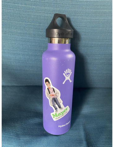 Phoebe's trusty water bottle, featuring a John Mayer Sticker
