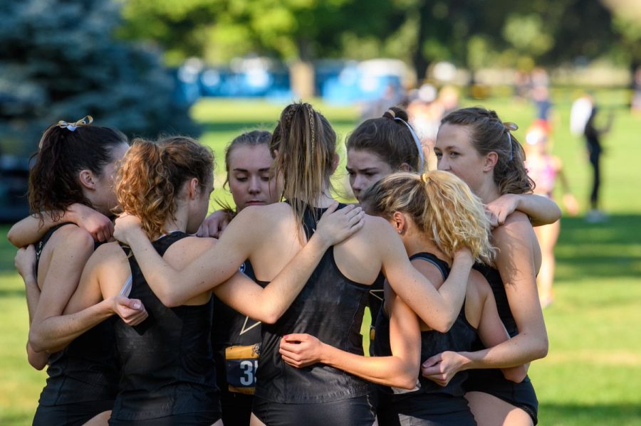 The Vanderbilt cross-country team huddles after a meet in October, 2021. (Vanderbilt Athletics)