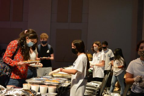 Students serving food at Sabor Latino, an event organized by the Association of Latin American Students, as photographed Oct. 6, 2021. (Photo Courtesy of Shelby Keuhnle)