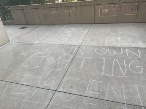 Inspirational quotes are drawn in chalk for Gen Chem students about to take an exam