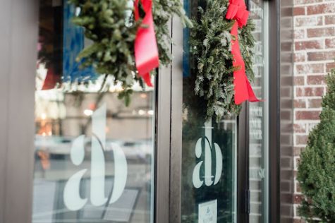 The doors of Anzie Blue with Christmas wreaths