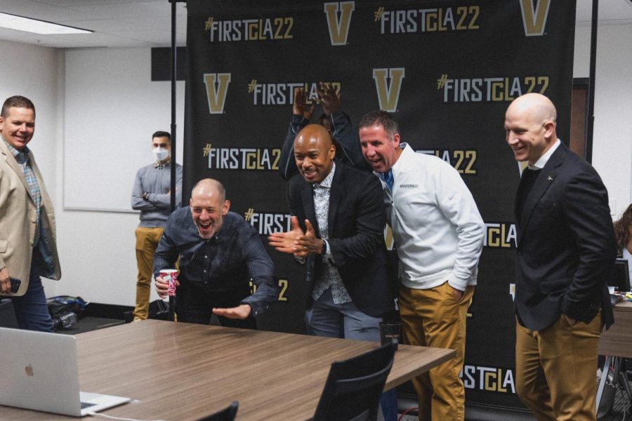 Vanderbilt head coach Clark Lea and position coaches celebrate Early Signing Day on Dec. 15, 2021.