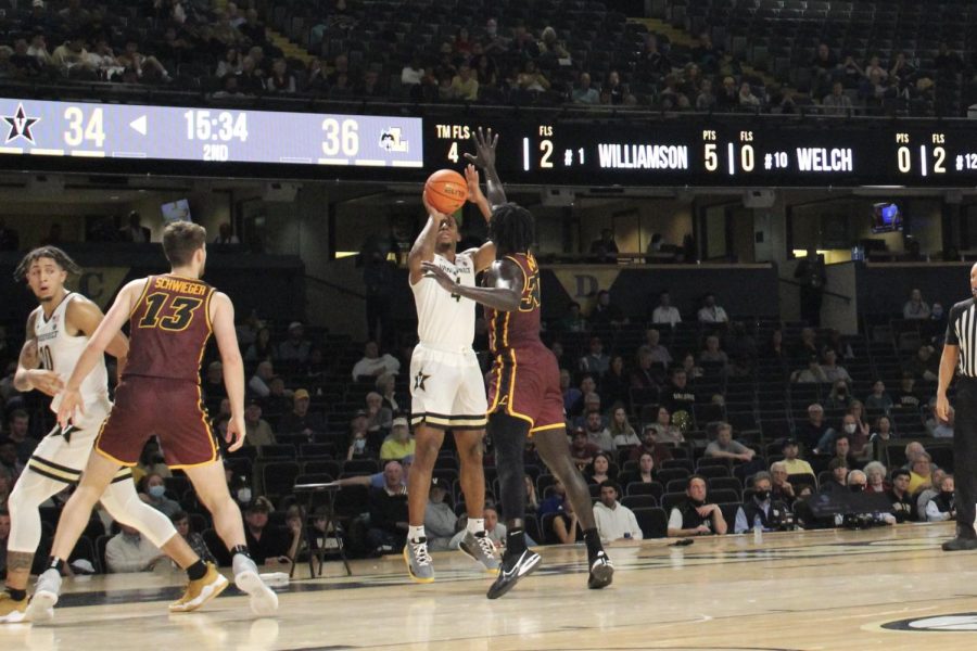 Jordan Wright rises for a 3-pointer against Loyola Chicago on Dec. 10, 2021.