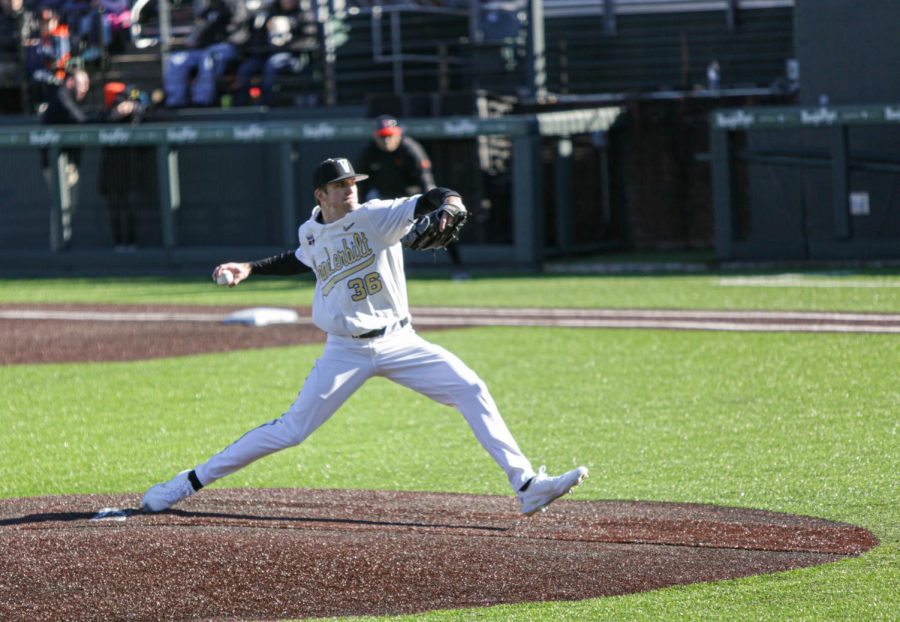 Grayson Moore delivers a pitch on Saturday, Feb. 19.
