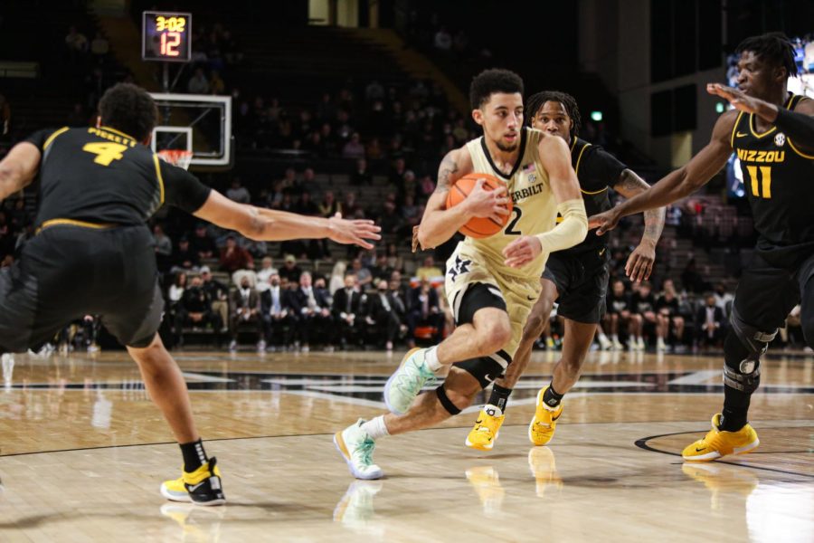 Vanderbilt junior Scotty Pippen Jr. driving through the lane against Missouri in the Commodores matchup on Feb. 8, 2022.