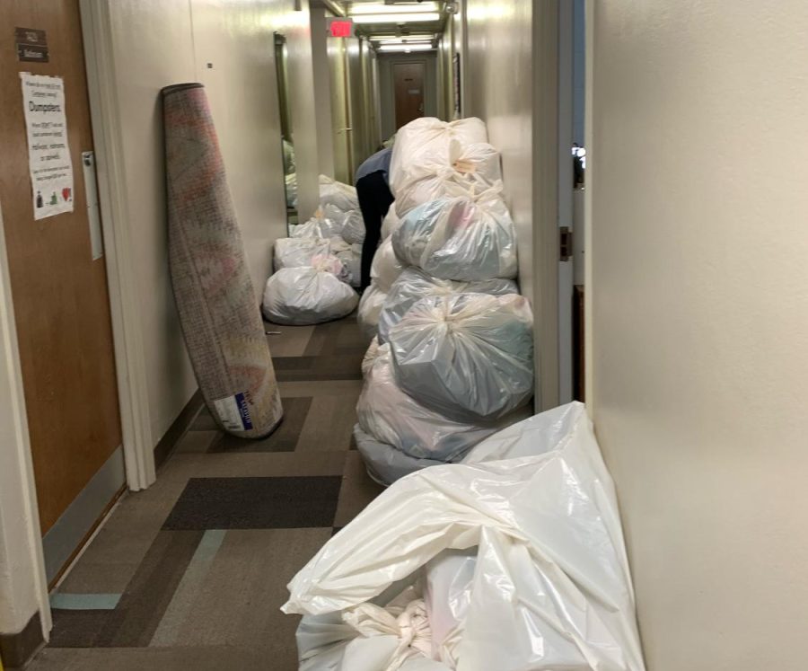 Bags of student belongings in the halls of the fourth floor of Lupton House