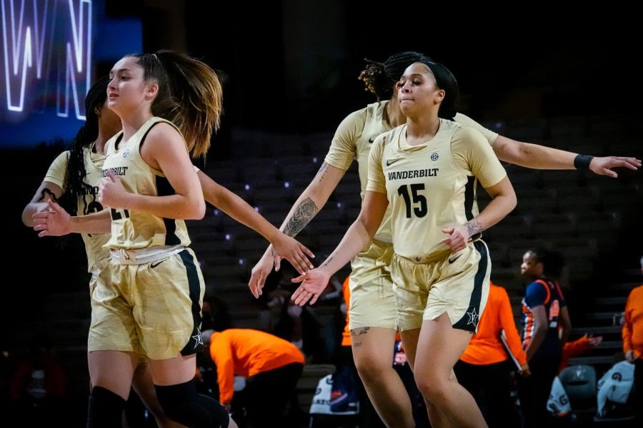 Vanderbilt players celebrate a basket during the Commodores win over Auburn on Jan. 30, 2022.
