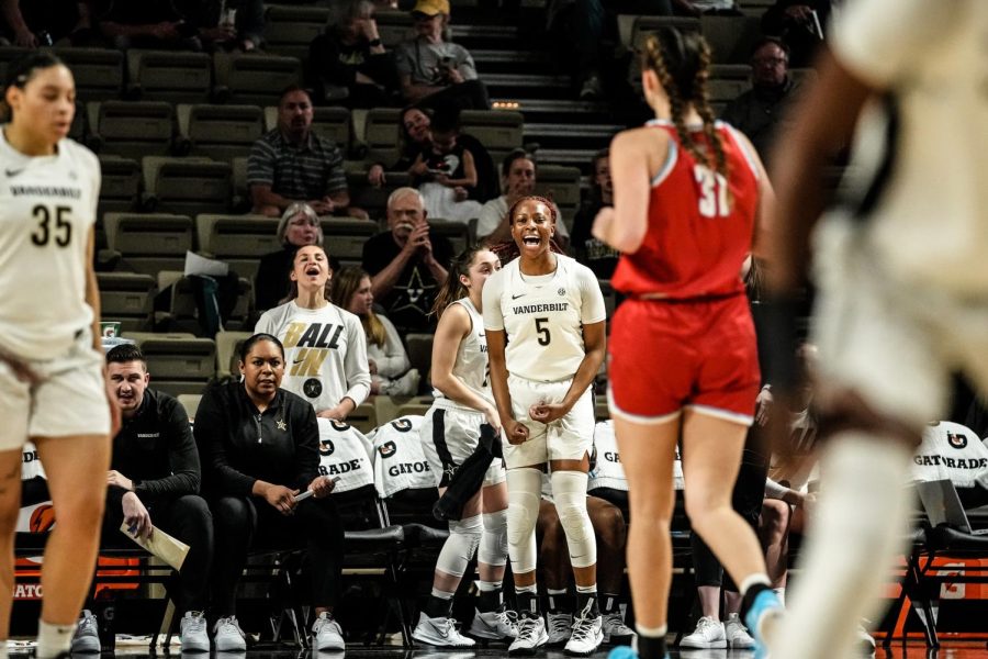 Yaubryon Chambers and the Vanderbilt bench celebrate during the Commodores Round 2 Matchup in the WNIT against the Liberty Flames. (Vanderbilt Athletics)