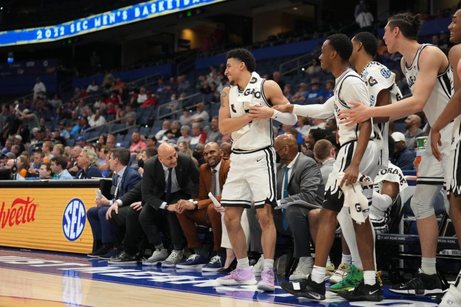 The Vanderbilt bench celebrates a shot late in the Commodores win over Georgia in Round 1 of the SEC Tournament on Mar. 9, 2022.