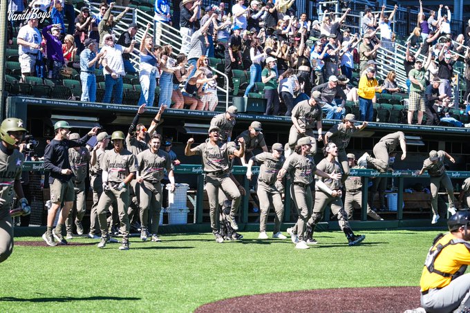 The Vanderbilt bench erupts after Carter Young gives the Commodores a lead in the seventh inning. (Vanderbilt Athletics)