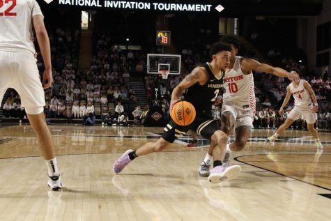 Scotty Pippen Jr. drives right during Vanderbilts NIT game against Dayton on Mar. 20, 2022.