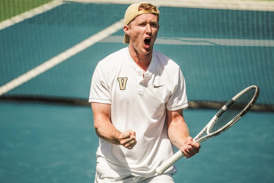 George+Harwell+celebrates+the+100th+singles+win+of+his+career+in+a+home+match+against+the+Tennessee+Volunteers+on+April+10%2C+2022.+%28Vanderbilt+Athletics%29