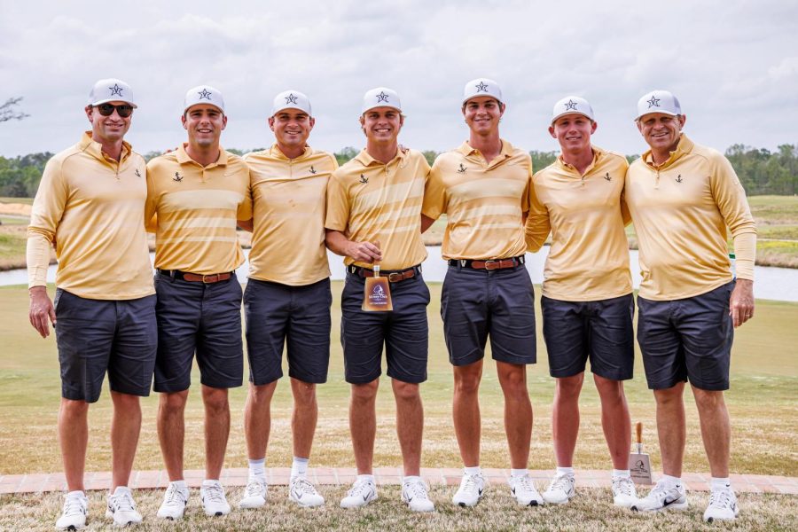 Vanderbilt mens golf poses with their championship trophy from the Mossy Oak Collegiate on April 12, 2022.