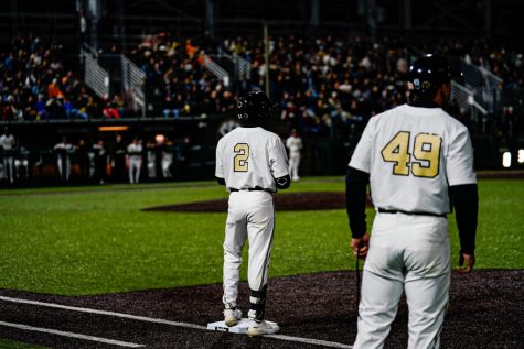 Outfielder Javi Vaz stands on first base during Vanderbilts loss to Tennessee on April 2, 2022.