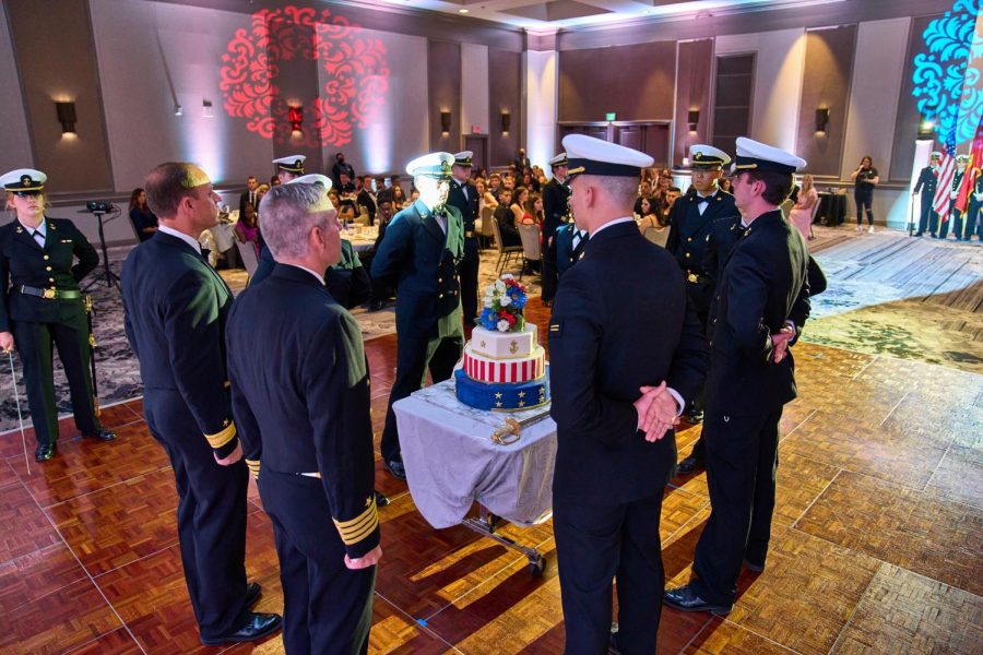 A cake is presented to commemorate the birthday of the Navy and Marines at the Navy and Marine Corps Birthday Ball. (Photo by Navy ROTC)
