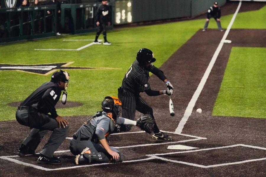 Freshman Davis Diaz swings at a pitch during Vanderbilts loss to Tennessee on April 1, 2022.