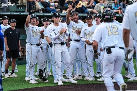 The VandyBoys celebrate during their win over Florida on April 16, 2022.