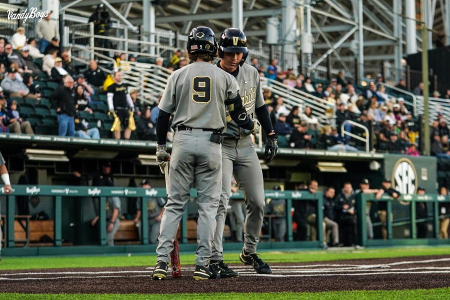 Carter+Young+and+Calvin+Hewett+celebrate+a+four-run+first+inning+against+Tennessee+Tech+on+April+19%2C+2022.+%28Vanderbilt+Athletics%29