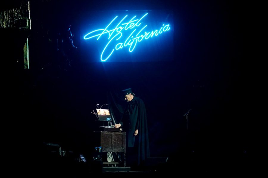 A mysterious figure kicked the Eagles concert off by putting the vinyl of the “Hotel California” album on a turntable, dropping the needle, as photographed on April 28, 2022. (Hustler Multimedia/Miguel Beristain)