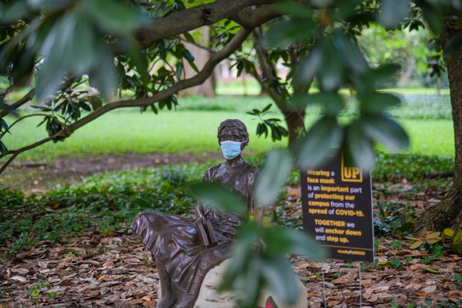 A statue on campus with a mask, as photographed on Sept. 6, 2020. (Hustler Multimedia/Truman McDaniel)
