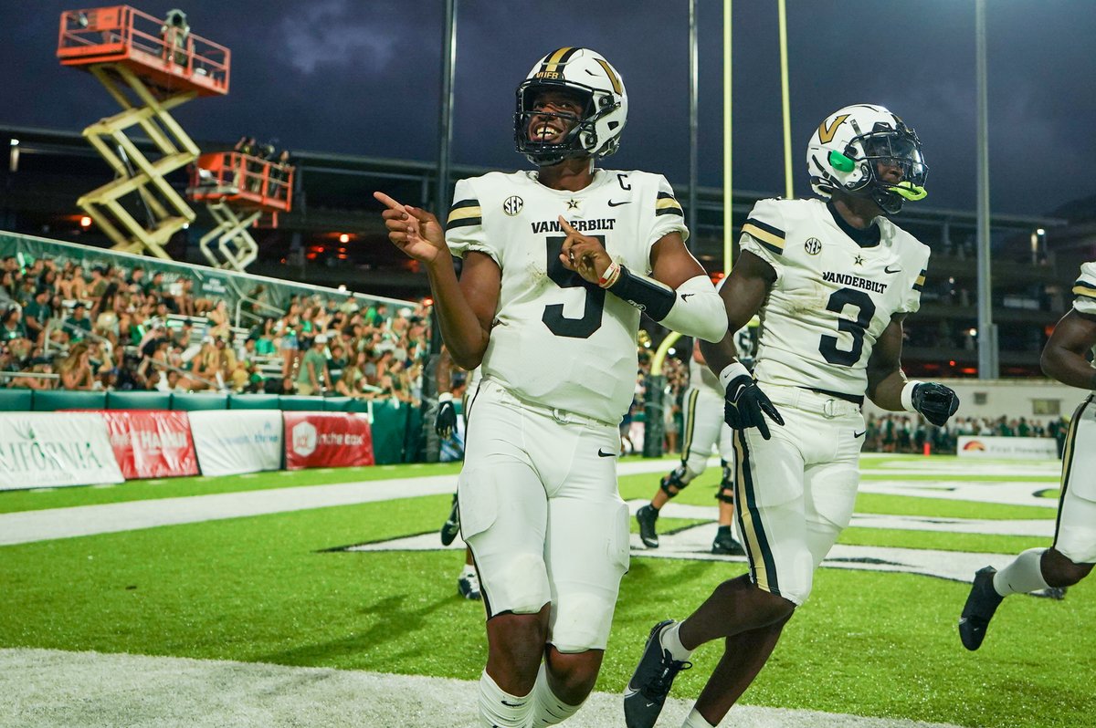 Mike Wright and Quincy Skinner celebrate after a 63-10 victory over Hawaii (Vanderbilt Athletics).