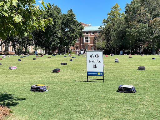 Backpacks lined Alumni Lawn as part of the Active Minds “Send Silence Packing” suicide awareness exhibit, as photographed on Sept. 8, 2022. (Hustler Staff/Brina Ratangee)