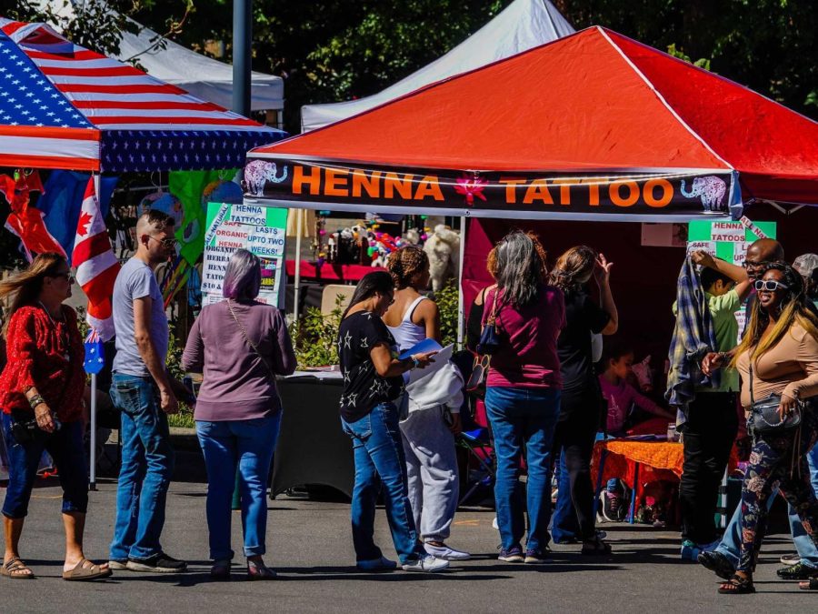 Participants queuing up to get a henna tattoo, photographed on Oct. 1, 2022. (Hustler Multimedia/Anseley Philippe)