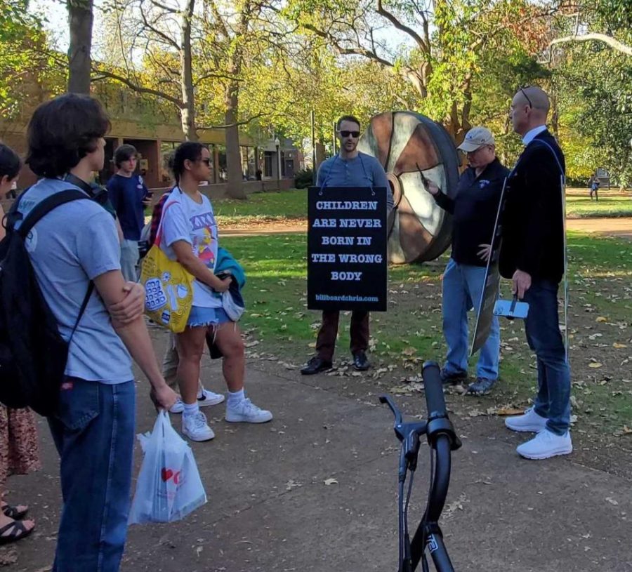 Conservative activist Chris Elston protesting outside of Rand, as photographed on Nov. 8, 2022. (Hustler Multimedia/Nikita Rohila)