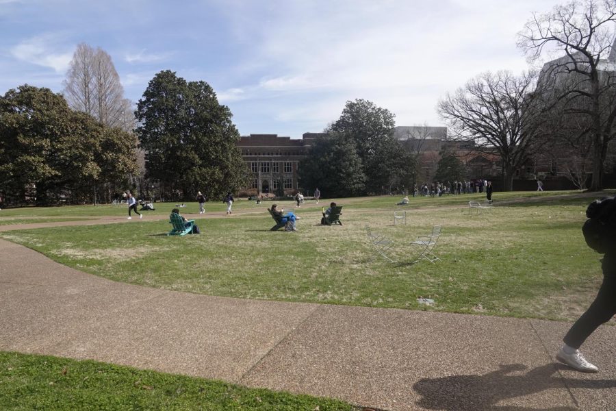 Students soak in the sunshine on Library Lawn, as photographed on Feb. 21, 2023. (Hustler Multimedia/Kevin Fall)
