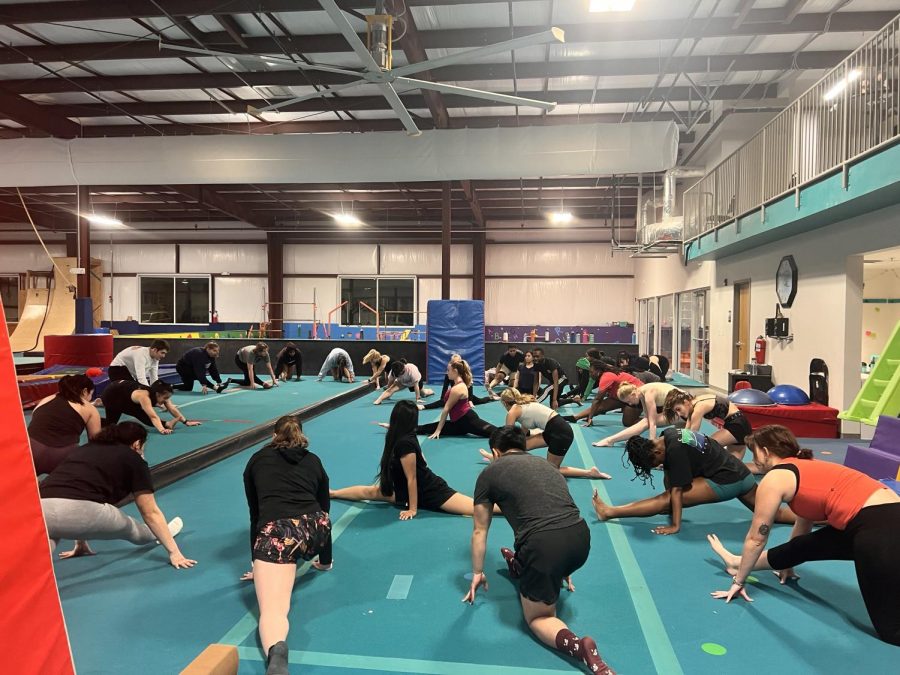 Members of the Vanderbilt Gymnastics Club warming up at the Nashville Gymnastics Training Center, as photographed Jan. 23. (Hustler Staff/Duaa Faquih)