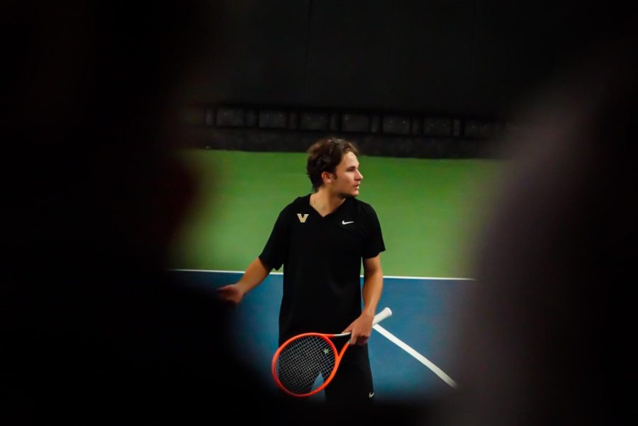 Men’s tennis player surveys the court, as photographed on Feb. 12, 2023. (Hustler Multimedia/Michael Tung)